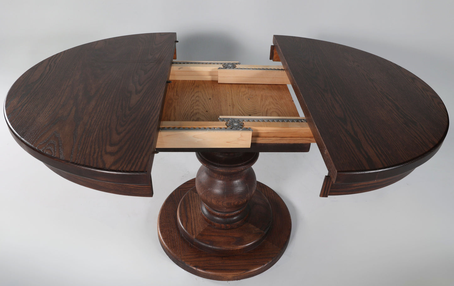 Flamed Oak Pedestal Dining Table (Expandable)