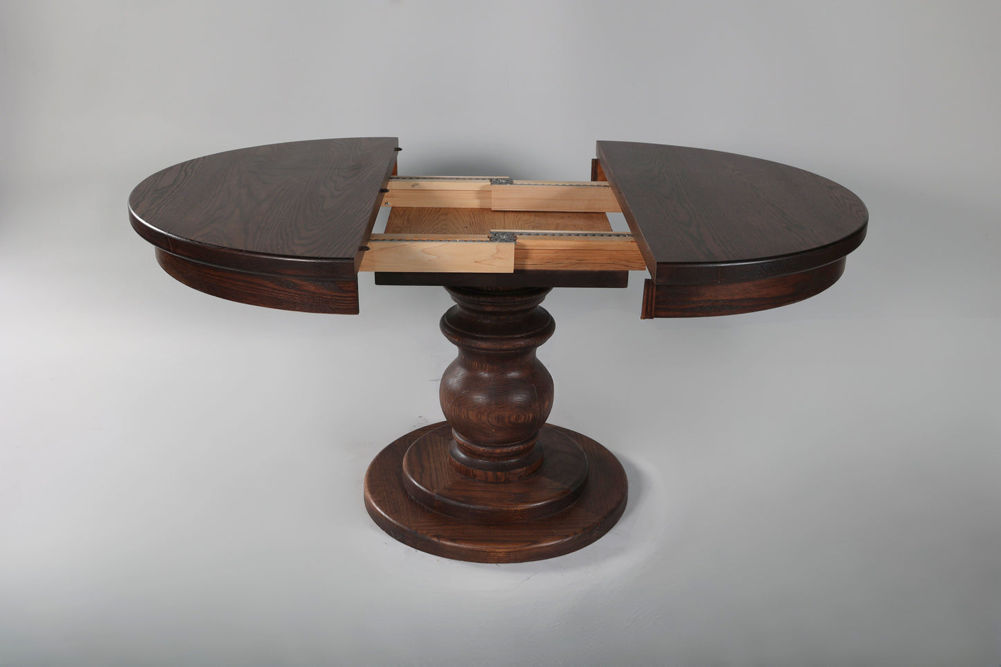 Flamed Oak Pedestal Dining Table (Expandable)