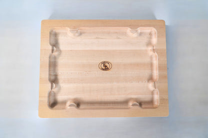 Wooden cutting board with a brand logo on a white background